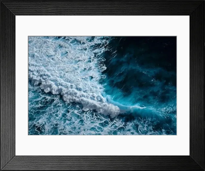 Framed Print : Aerial view to ocean waves. Blue water background Framed Print : Aerial view to ocean waves. Blue water background