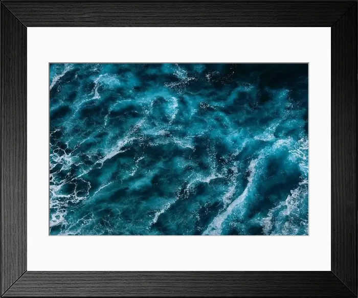 Framed Print : Aerial view to ocean waves. Blue water background. Dramatic colors photo Framed Print : Aerial view to ocean waves. Blue water background. Dramatic colors photo