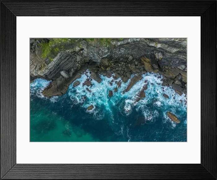 Framed Print : Detail of sea waves colors breaking in the coast of Lekeitio, Basque country - drone aerial view Framed Print : Detail of sea waves colors breaking in the coast of Lekeitio, Basque country - drone aerial view