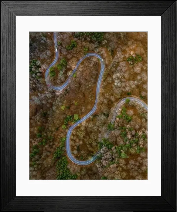 Framed Print : Aerial view of autumn forest with a curvy road. Captured from above with a drone in Bavaria, germany Framed Print : Aerial view of autumn forest with a curvy road. Captured from above with a drone in Bavaria, germany