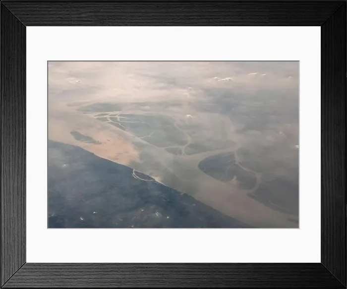 Framed Print : Aerial View of the magnificent Bramhaputra River in Bangladesh from the airplane. selective focus Framed Print : Aerial View of the magnificent Bramhaputra River in Bangladesh from the airplane. selective focus