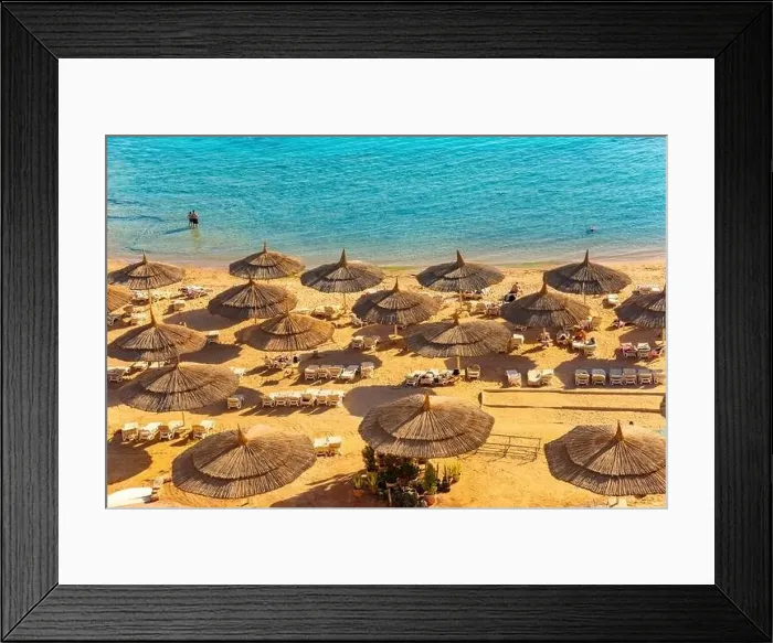 Framed Print : Red sea beach from aerial top view. Tourists relaxing under umbrellas on luxury resort, Egypt Framed Print : Red sea beach from aerial top view. Tourists relaxing under umbrellas on luxury resort, Egypt