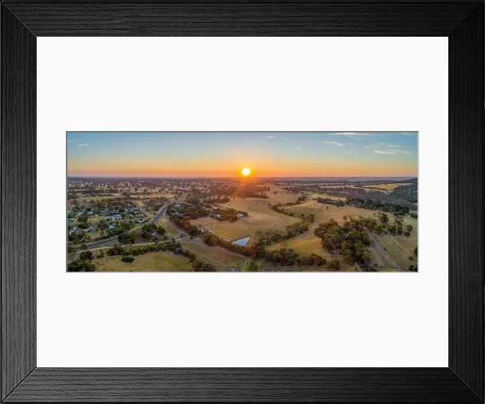 Framed Print : Sun touching the horizon at sunset over Australian outback - wide aerial panorama Framed Print : Sun touching the horizon at sunset over Australian outback - wide aerial panorama