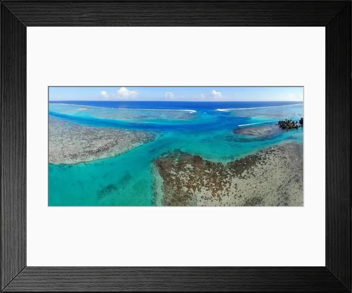 Framed Print : Aerial view of shades of blue and coral reefs over the Moorea lagoon in French Polynesia, South Pacific Framed Print : Aerial view of shades of blue and coral reefs over the Moorea lagoon in French Polynesia, South Pacific