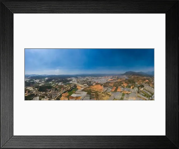 Framed Print : Dalat or Da Lat, Vietnam aerial panorama of agricultural area showing farms Framed Print : Dalat or Da Lat, Vietnam aerial panorama of agricultural area showing farms