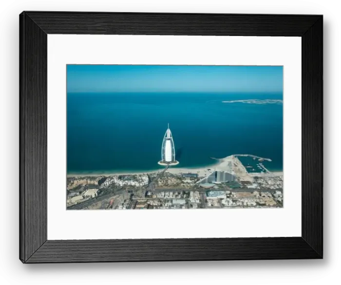 Framed Print : Aerial view from a plane of Dubai Jumeirah district cityscape on a sunny day. Dubai, United Arab Emirates Framed Print : Aerial view from a plane of Dubai Jumeirah district cityscape on a sunny day. Dubai, United Arab Emirates