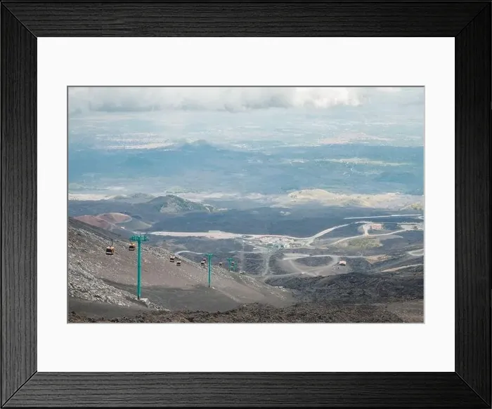 Framed Print : Top of crater Mount Etna volcano, frozen cold lava smokes, thick clouds Framed Print : Top of crater Mount Etna volcano, frozen cold lava smokes, thick clouds