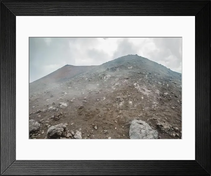 Framed Print : Top of crater Mount Etna volcano, frozen cold lava smokes, thick clouds Framed Print : Top of crater Mount Etna volcano, frozen cold lava smokes, thick clouds