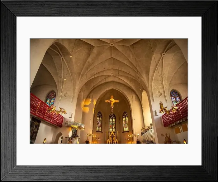 Framed Print : Lulea Sweden Catholic Cathedral in sunlight, statue of Jesus on cross sunset Framed Print : Lulea Sweden Catholic Cathedral in sunlight, statue of Jesus on cross sunset