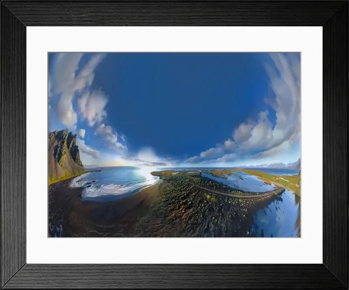 Framed Print : Epic aerial drone view flying over landscape of the black sand beach in Stokksnes on a sunny day Framed Print : Epic aerial drone view flying over landscape of the black sand beach in Stokksnes on a sunny day