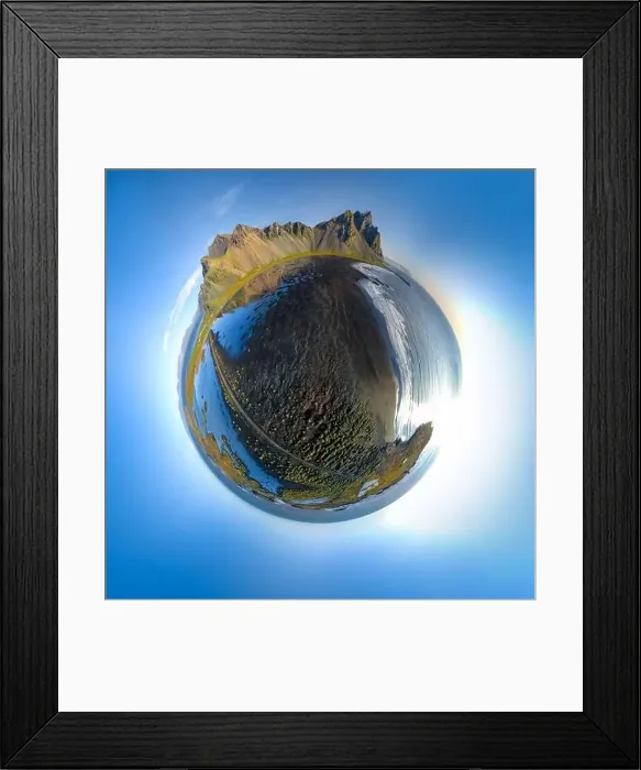 Framed Print : Epic aerial drone view flying over landscape of the black sand beach in Stokksnes on a sunny day Framed Print : Epic aerial drone view flying over landscape of the black sand beach in Stokksnes on a sunny day