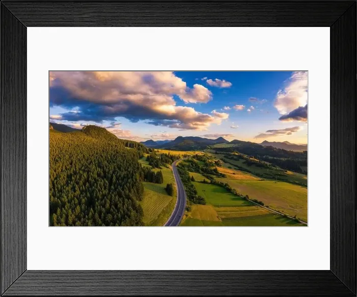 Framed Print : Road going through forests of the Liptov region in Slovakia at sunset Framed Print : Road going through forests of the Liptov region in Slovakia at sunset