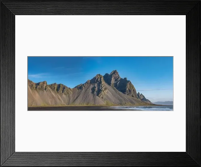 Framed Print : Epic aerial drone view flying over landscape of the black sand beach in Stokksnes on a sunny day Framed Print : Epic aerial drone view flying over landscape of the black sand beach in Stokksnes on a sunny day