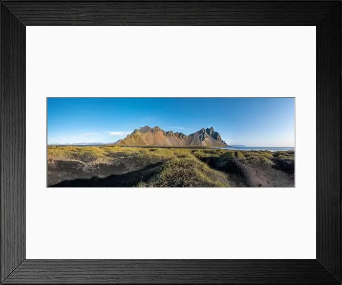 Framed Print : Epic aerial drone view flying over landscape of the black sand beach in Stokksnes on a sunny day Framed Print : Epic aerial drone view flying over landscape of the black sand beach in Stokksnes on a sunny day