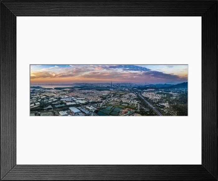 Framed Print : Aerial View of rural green fields in Hong Kong border and skylines in Shenzhen, China Framed Print : Aerial View of rural green fields in Hong Kong border and skylines in Shenzhen, China