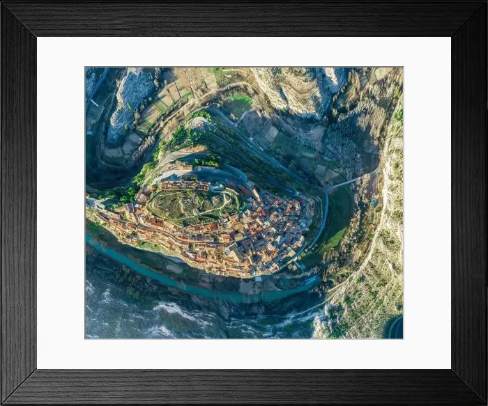 Framed Print : Aerial top down view of the Jucar river surrounding the medieval hilltop town of Jorquera in Spain Framed Print : Aerial top down view of the Jucar river surrounding the medieval hilltop town of Jorquera in Spain
