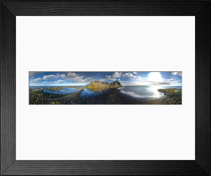 Framed Print : Epic aerial drone view flying over landscape of the black sand beach in Stokksnes on a sunny day Framed Print : Epic aerial drone view flying over landscape of the black sand beach in Stokksnes on a sunny day