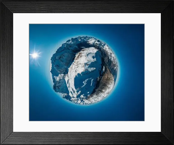 Framed Print : Panoramic aerial drone little planet view of an snowy mountains Framed Print : Panoramic aerial drone little planet view of an snowy mountains