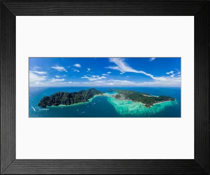 Framed Print : Blue clear water with boats. Green tropical island Phi Phi Framed Print : Blue clear water with boats. Green tropical island Phi Phi