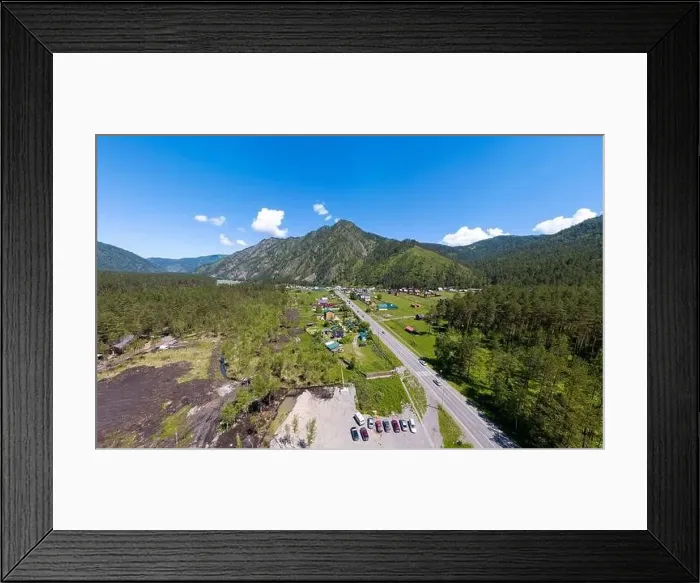 Framed Print : Aerial view of country houses in the village near the highway Framed Print : Aerial view of country houses in the village near the highway