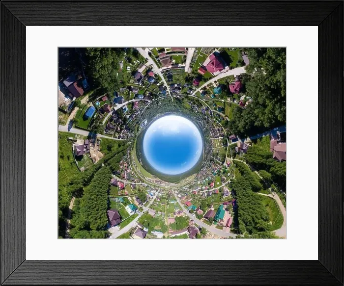 Framed Print : 360 degree panoramic aerial drone view of an abstract world turned inside out planet earth with many houses in Framed Print : 360 degree panoramic aerial drone view of an abstract world turned inside out planet earth with many houses in
