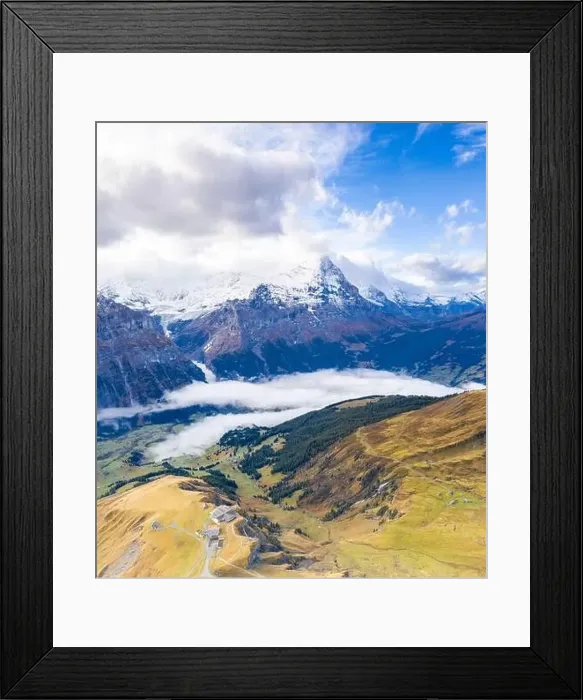 Framed Print : Snow capped Eiger peak seen from the alpine villages of Grindelwald and First in autumn
