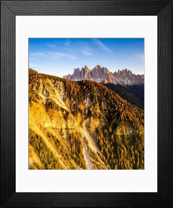 Framed Print : Aerial panoramic of sunset over colorful woods in autumn surrounding the Odle Framed Print : Aerial panoramic of sunset over colorful woods in autumn surrounding the Odle