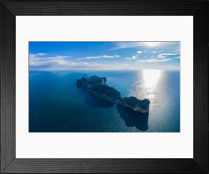 Framed Print : Top view of tropical island with limestone rocks