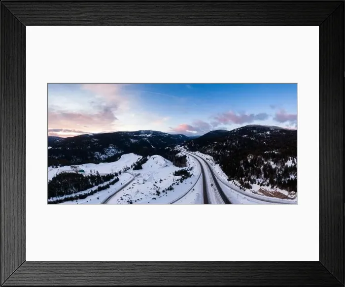 Framed Print : Aerial Panoramic View of a scenic Highway passing in the Canadian Mountain Landscape during a colorful winter sunrise Framed Print : Aerial Panoramic View of a scenic Highway passing in the Canadian Mountain Landscape during a colorful winter sunrise