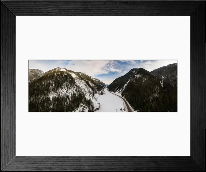 Framed Print : Aerial Panoramic View of a scenic Highway in the valley between Canadian Mountain Landscape in winter Framed Print : Aerial Panoramic View of a scenic Highway in the valley between Canadian Mountain Landscape in winter