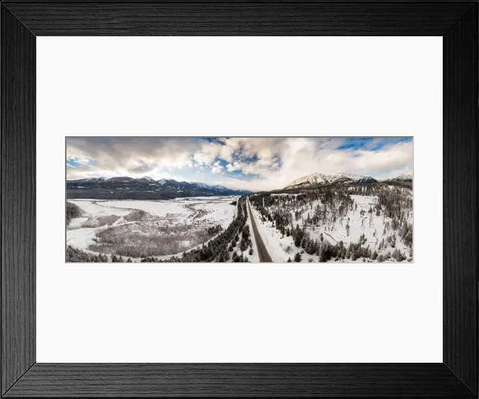 Framed Print : Beautiful Aerial Panoramic View of a road in Canadian Mountain Landscape during a vibrant winter sunset Framed Print : Beautiful Aerial Panoramic View of a road in Canadian Mountain Landscape during a vibrant winter sunset