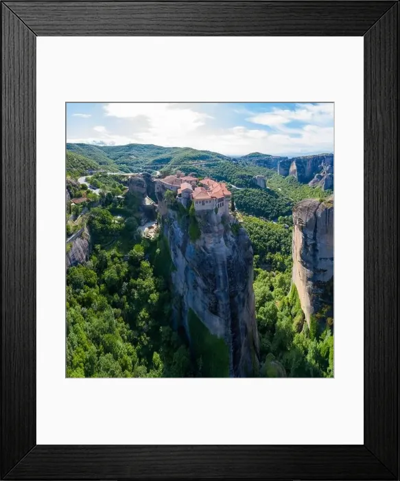 Framed Print : Aerial panorama view of a slide from a drone on a panorama of a mountain range Framed Print : Aerial panorama view of a slide from a drone on a panorama of a mountain range