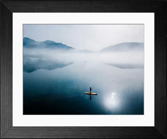 Framed Print : Aerial view of woman stand up paddle surfing, Leon, Spain
