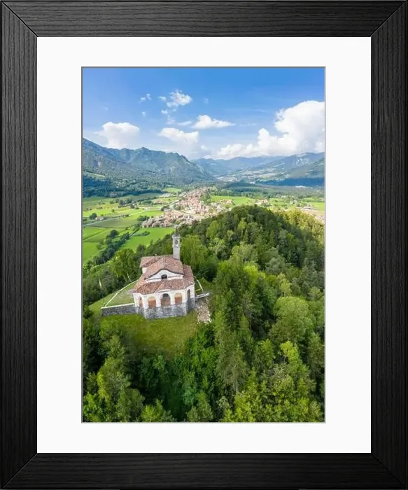 Framed Print : Aerial view of the fields surrounding the small church of Chiesa della Santissima Trinità in Clusone city Framed Print : Aerial view of the fields surrounding the small church of Chiesa della Santissima Trinità in Clusone city