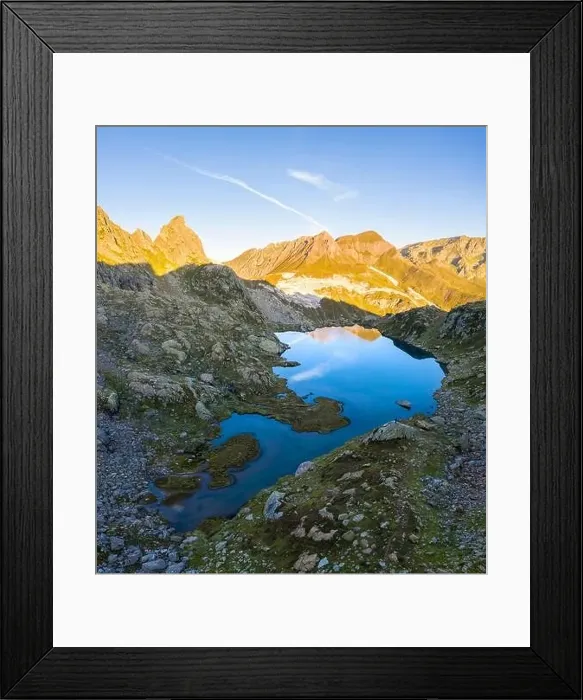 Framed Print : Aerial view at sunrise of the Pizzo Prevat reflected on Lago Leit Framed Print : Aerial view at sunrise of the Pizzo Prevat reflected on Lago Leit