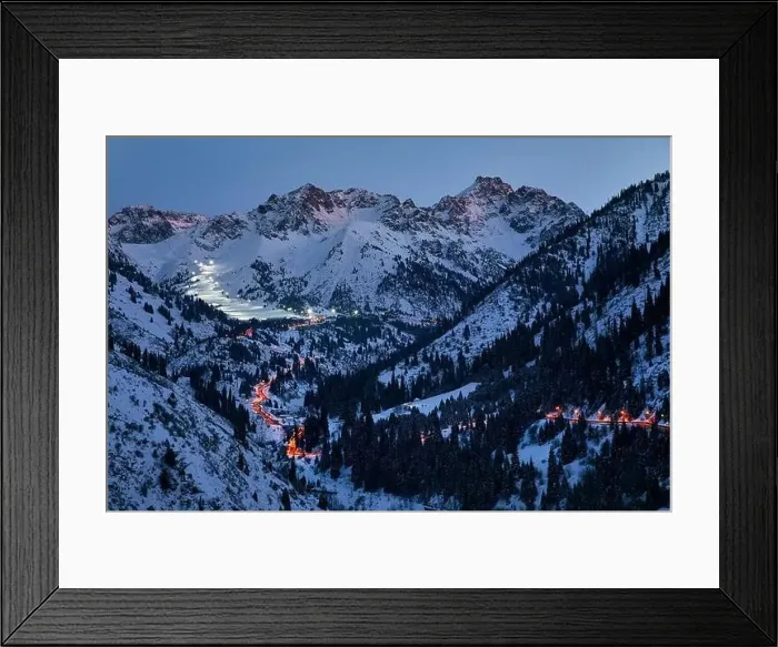 Framed Print : Landscape of glowing road from Medeu ice skate to Shymbulak ski resort at Tian Shan mountains at evening time in Almaty Framed Print : Landscape of glowing road from Medeu ice skate to Shymbulak ski resort at Tian Shan mountains at evening time in Almaty