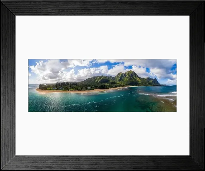 Framed Print : Aerial panoramic image off the coast over Tunnels beach on Hawaiian island of Kauai with Na Pali mountains behind Framed Print : Aerial panoramic image off the coast over Tunnels beach on Hawaiian island of Kauai with Na Pali mountains behind