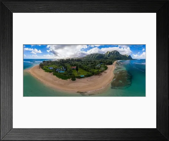 Framed Print : Aerial panoramic image off the coast over Tunnels beach on Hawaiian island of Kauai with Na Pali mountains behind Framed Print : Aerial panoramic image off the coast over Tunnels beach on Hawaiian island of Kauai with Na Pali mountains behind