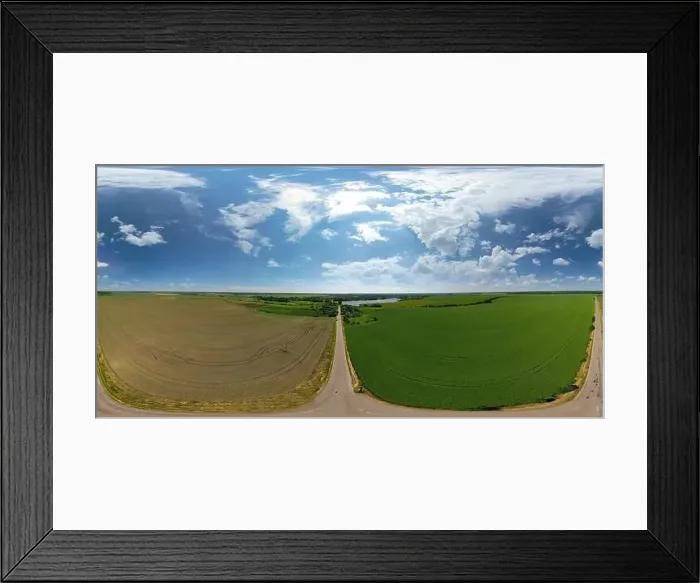 Framed Print : Landscape of green and brown field. Farmland and road. Beautiful blue sky with big clouds Framed Print : Landscape of green and brown field. Farmland and road. Beautiful blue sky with big clouds