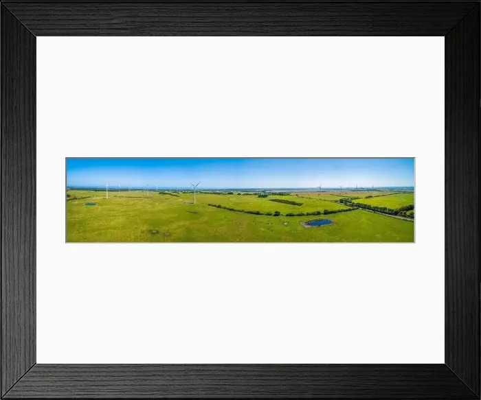 Framed Print : Wide aerial panorama of wind farm and grazelands on bright sunny day in Australia Framed Print : Wide aerial panorama of wind farm and grazelands on bright sunny day in Australia