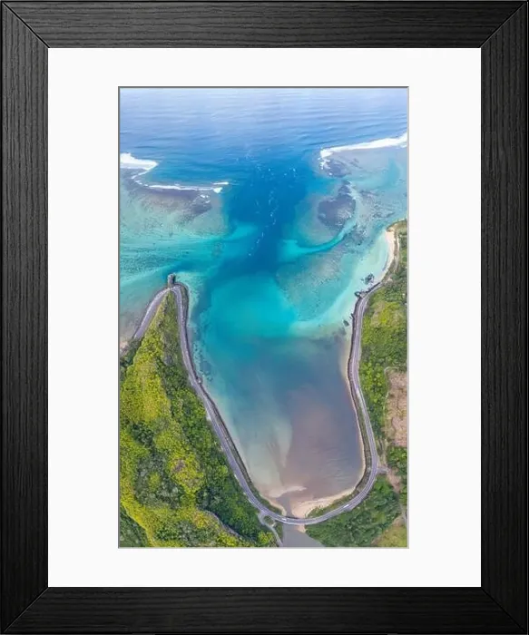 Framed Print : Coastal road facing the turquoise lagoon
