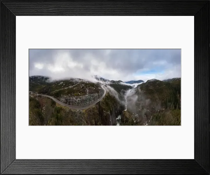 Framed Print : Aerial Panoramic drone view of Sea to Sky Highway during a cloudy winter morning Framed Print : Aerial Panoramic drone view of Sea to Sky Highway during a cloudy winter morning