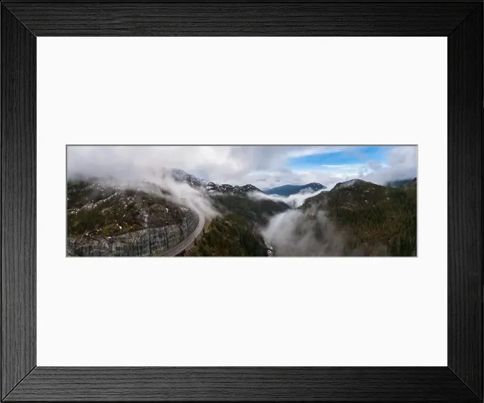Framed Print : Aerial Panoramic drone view of Sea to Sky Highway during a cloudy winter morning Framed Print : Aerial Panoramic drone view of Sea to Sky Highway during a cloudy winter morning