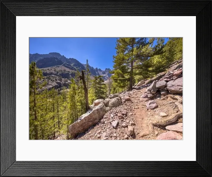 Framed Print : Walking track in Asco river gorge with view on Cinto mountain in Haute Corse on Corsica island, France Framed Print : Walking track in Asco river gorge with view on Cinto mountain in Haute Corse on Corsica island, France