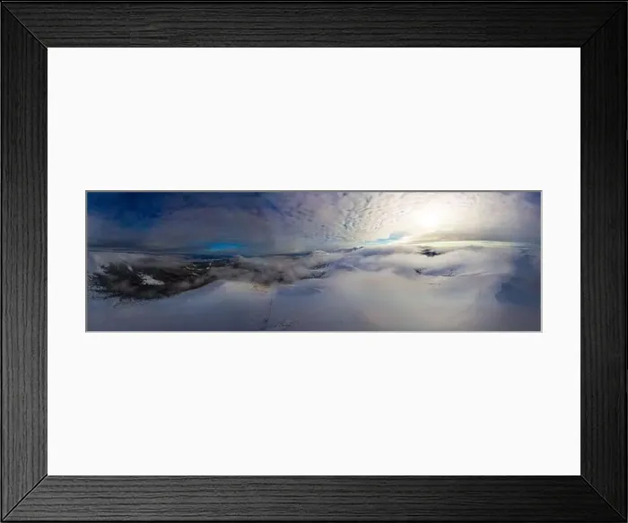 Framed Print : Aerial view of the stunning winter panorama of the snowy slopes and hills among the lush white clouds Framed Print : Aerial view of the stunning winter panorama of the snowy slopes and hills among the lush white clouds