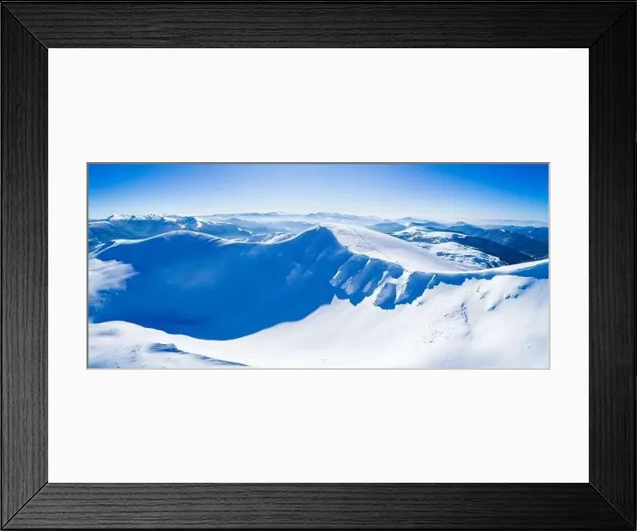 Framed Print : Wonderful giant snowdrifts on the hills in the mountains covered in snow on a sunny frosty winter day Framed Print : Wonderful giant snowdrifts on the hills in the mountains covered in snow on a sunny frosty winter day
