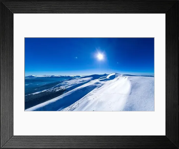 Framed Print : Fabulous view of the sunny winter slope with snowy trees located in the ski resort Framed Print : Fabulous view of the sunny winter slope with snowy trees located in the ski resort
