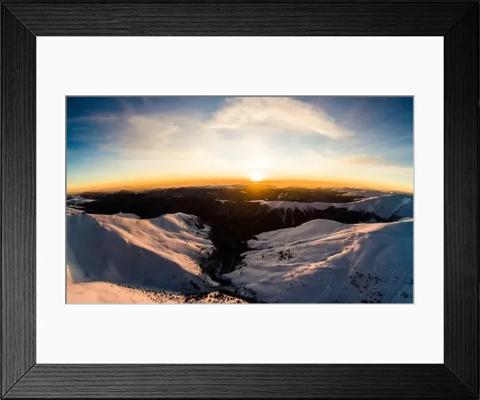 Framed Print : Magical winter panorama of beautiful snowy slopes at a ski resort in Europe on a sunny Framed Print : Magical winter panorama of beautiful snowy slopes at a ski resort in Europe on a sunny