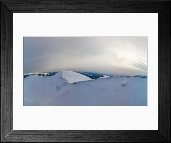 Framed Print : Stunning view of the cliffs covered with snow and trees on a cloudy winter day at the ski resort Framed Print : Stunning view of the cliffs covered with snow and trees on a cloudy winter day at the ski resort