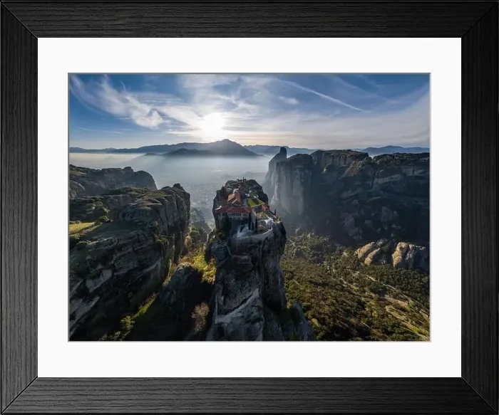 Framed Print : Aerial view of monastery Trinity and breathtaking pictures of valley and landmark canyon of Meteora at sunset Framed Print : Aerial view of monastery Trinity and breathtaking pictures of valley and landmark canyon of Meteora at sunset
